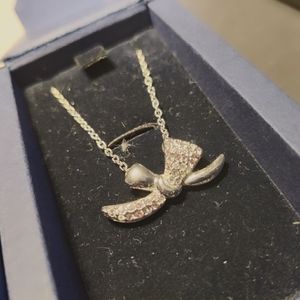 Brand new Swarovski bow necklace